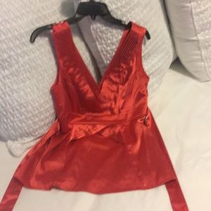 Red sleeveless blouse